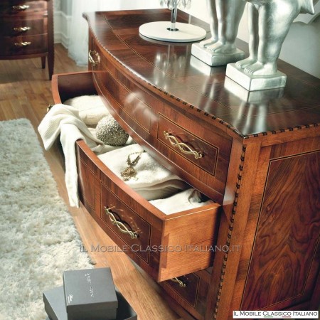 Walnut shaped chest of drawers
