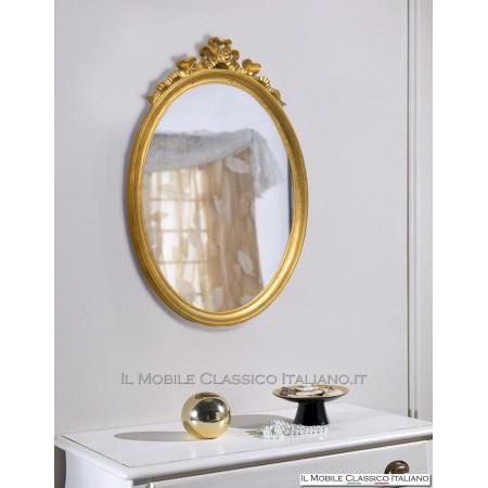 Miroir ovale baroque avec chaperon