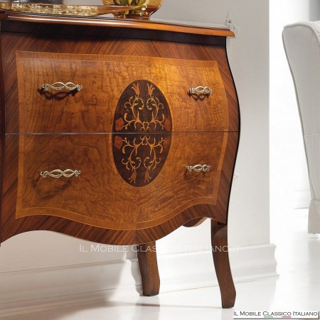 Cómoda convexa con incrustaciones