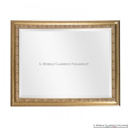 espejo con marco dorado