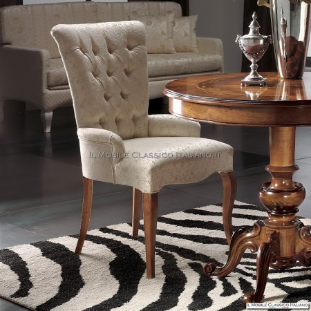 Armchair with armrests