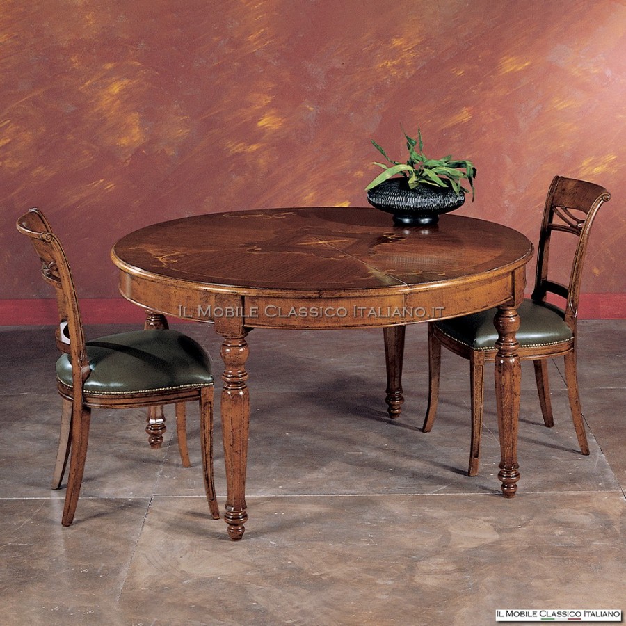 Mesa de comedor redonda extensible Mesa de comedor redonda extensible